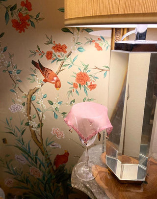 pink silk drink marker draped over a glass wine